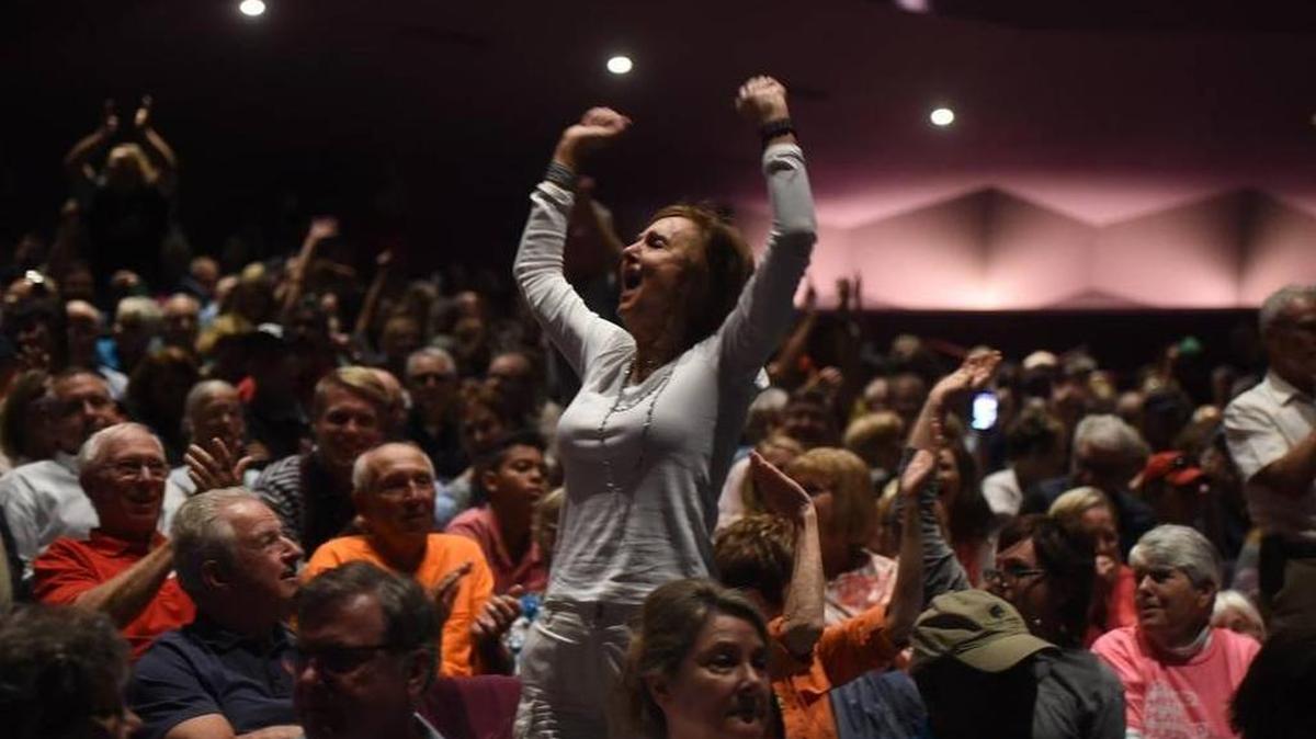 FILE PHOTO: It was a loud and boisterous crowd at Vern Buchanan’s town hall March 18 at the Van Wezel in Sarasota.