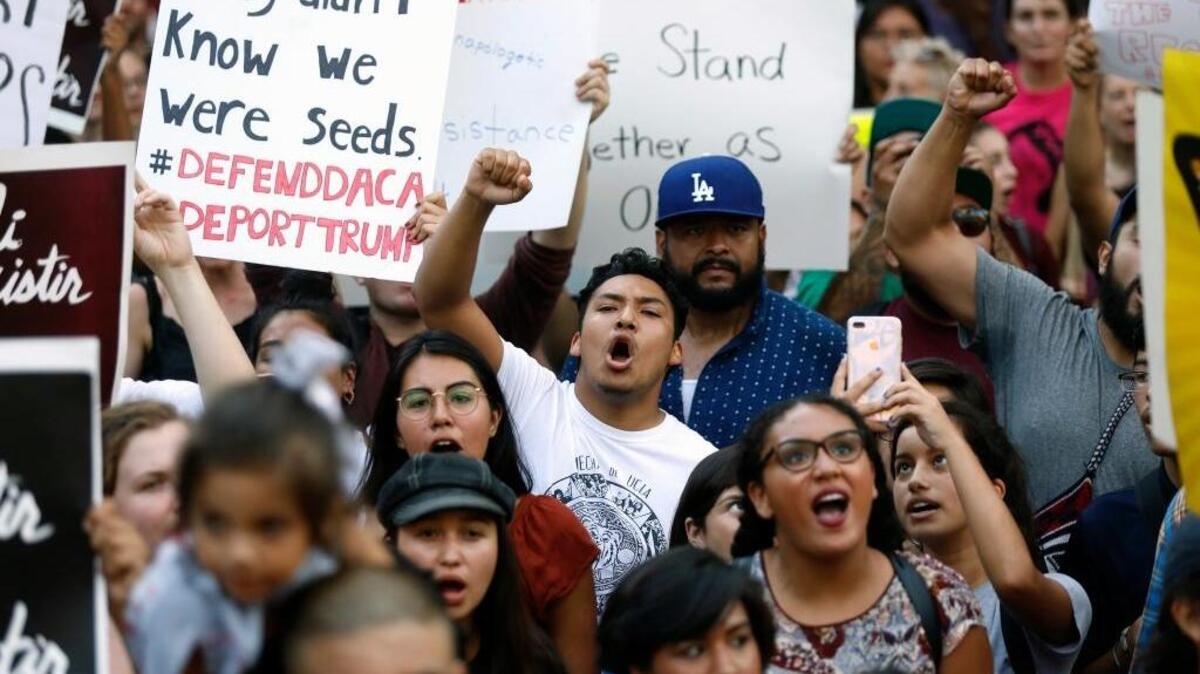 Protesters gather to demonstrate against changes in the Deferred Action for Childhood Arrivals (DACA) immigration policy at City Hall in Los Angeles on Tuesday.