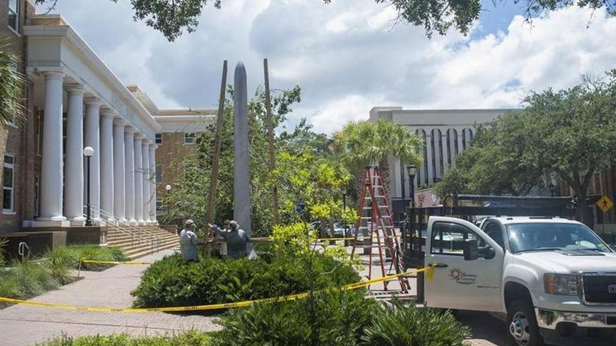 FILE: Workers began to cover the Confederate Monument outside of the Manatee County Historic Courthouse Aug. 19, 2017 in downtown Bradenton.