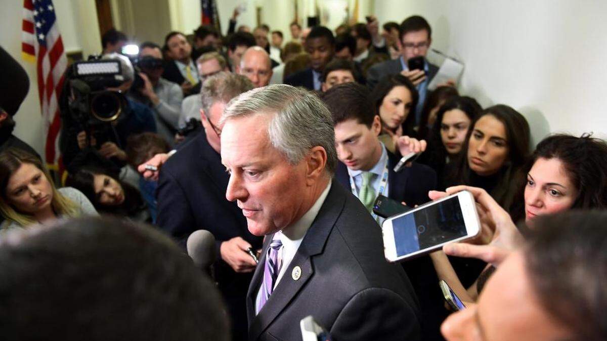 Rep. Mark Meadows, R-N.C., chairman of the House Freedom Caucus, talks with the press after meeting for hours about the Affordable Care Act this week. According to the nonpartisan CBO, the GOP bill broke a fundamental promise GOP leaders made to the public regarding preexisting conditions.
