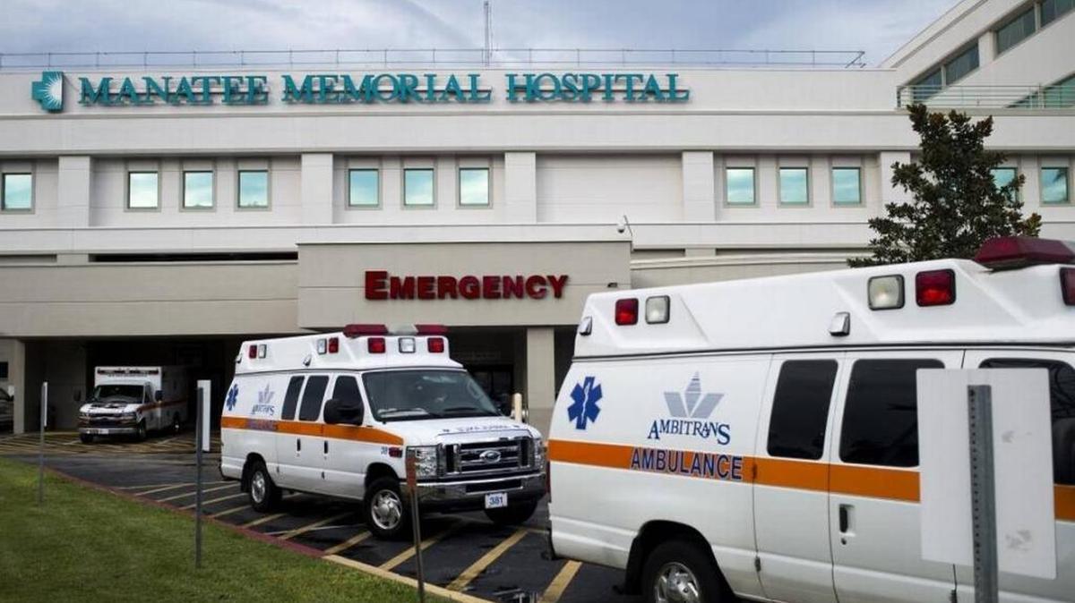 FILE: Ambulances lined up in front of Manatee Memorial Hospital in preparation for their building-wide evacuation in Bradenton.