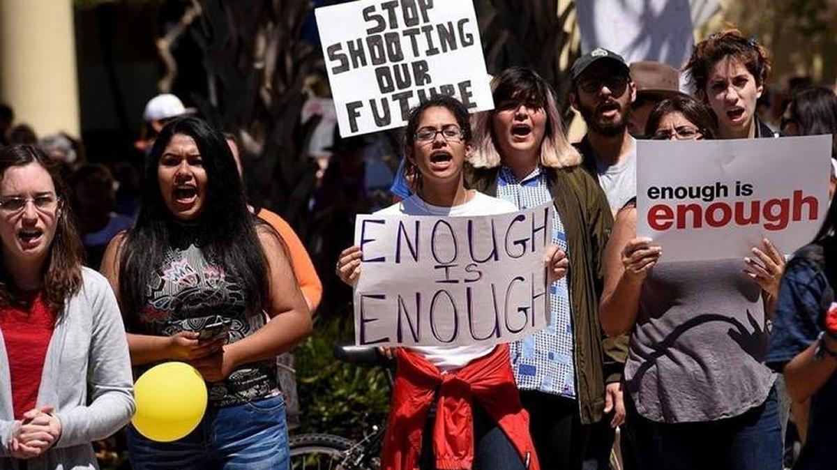 Supporters chant for Manatee's March for Our Lives rally on March 24, coinciding with over 800 worldwide rallies.