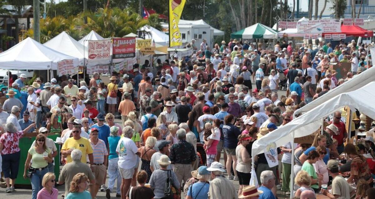 Visitors pack the food area at a past Cortez Commercial Fishing Festival.