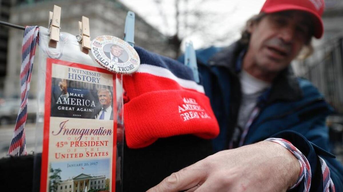 Vendors sell their President-elect Donald Trump wares in Washington, Thursday, Jan. 19, 2017, as preparations continue for Friday's presidential inauguration.