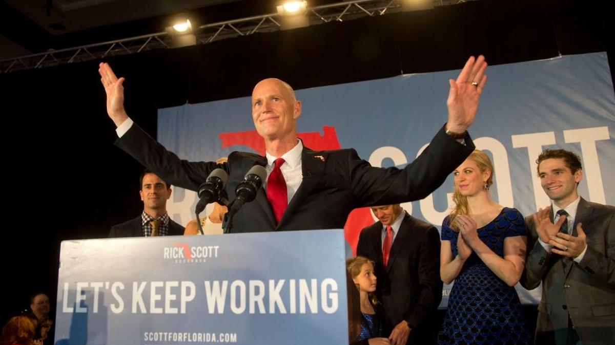 FILE PHOTO: Gov. Rick Scott stands at the podium to make a victory speech after defeating Democratic challenger, former Republican, Charlie Crist, on Nov. 4, 2014 in Bonita Springs.