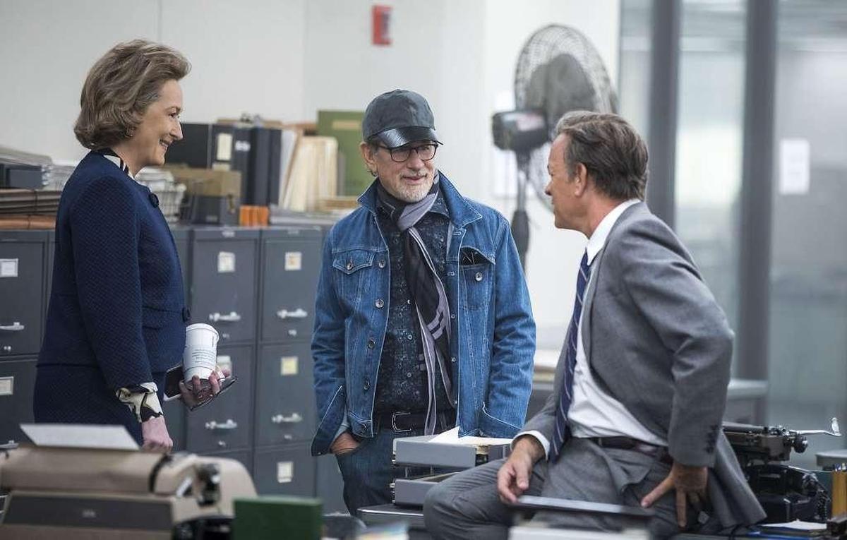 Image released by 20th Century Fox shows actress Meryl Streep, from left, director Steven Spielberg, and actor Tom Hanks on the set of "The Post." Spielberg’s newspaper drama has been named the year’s best film by the National Board of Review, which also lavished its top acting honors on the film’s stars, Streep and Hanks.