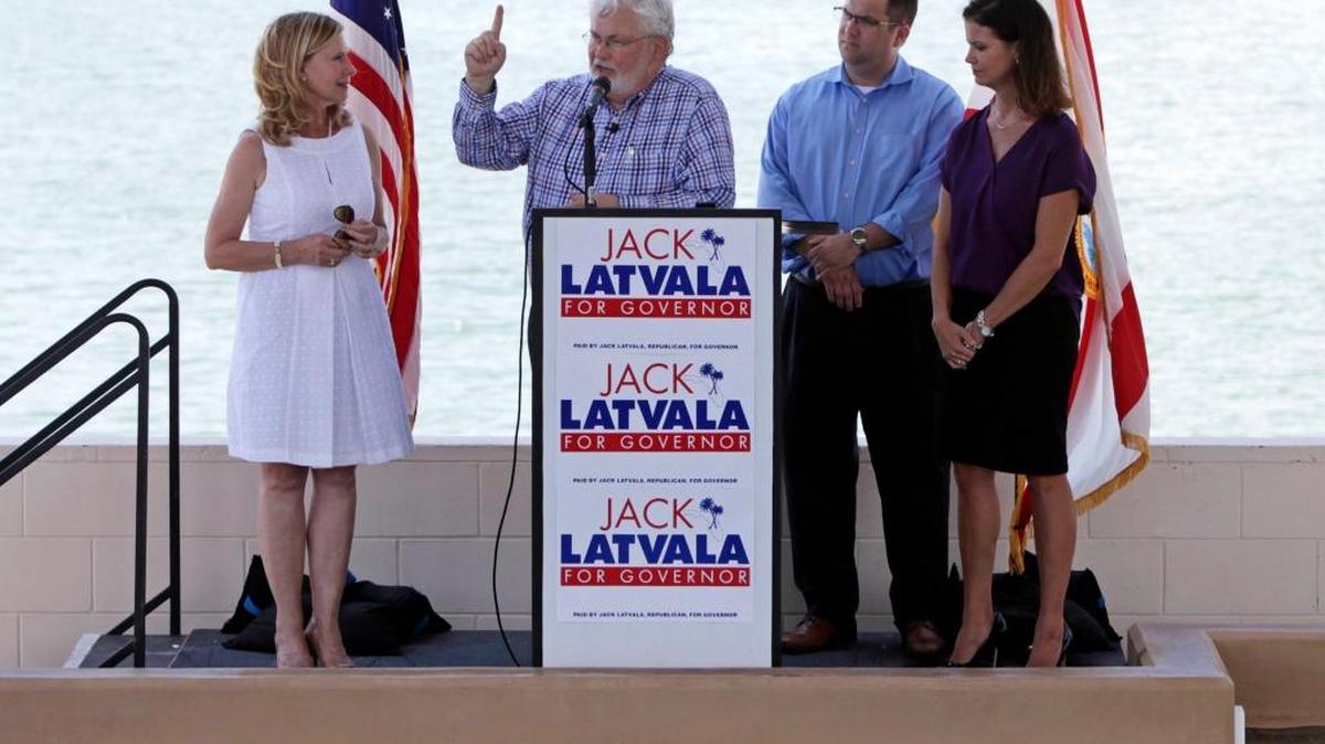 State Senator Jack Latvala, R-Clearwater, second from left, announces his plan to run for governor Wednesday at the Clearwater Marine Aquarium. With Latvala from left are his wife, Connie Prince, son, State Rep. Chris Latvala and daughter, Stephanie Courson.
