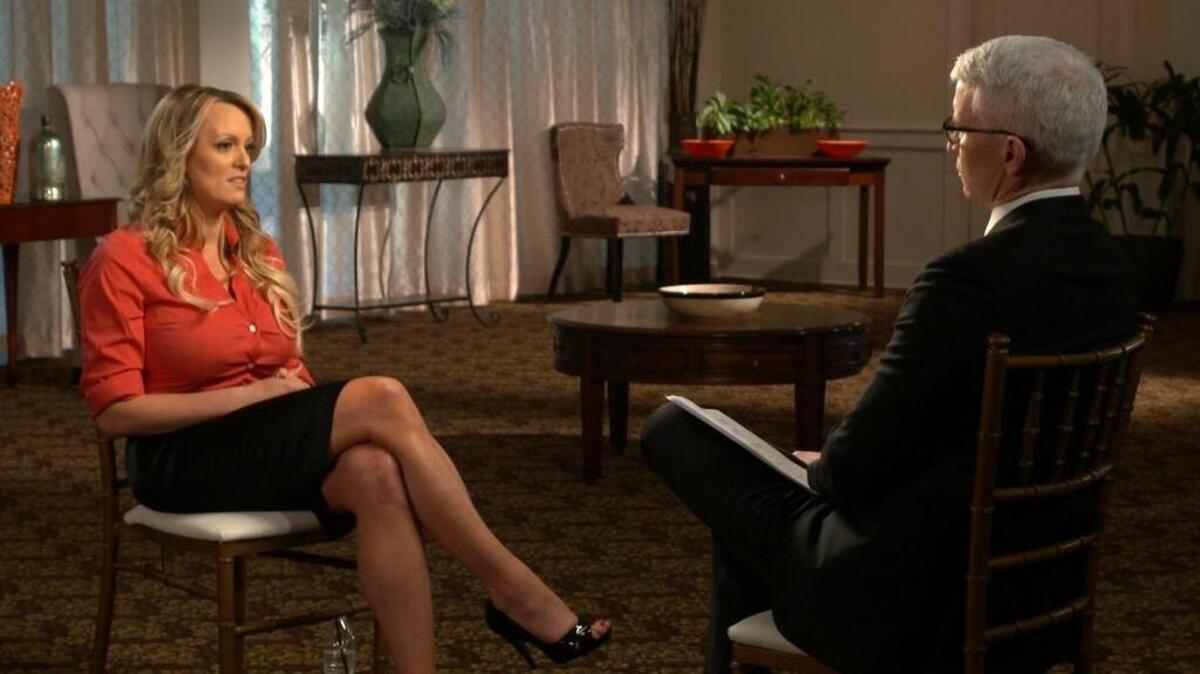 This image released by CBS News shows Stormy Daniels, left, during an interview with Anderson Cooper which will air on Sunday, March 25, on "60 Minutes."