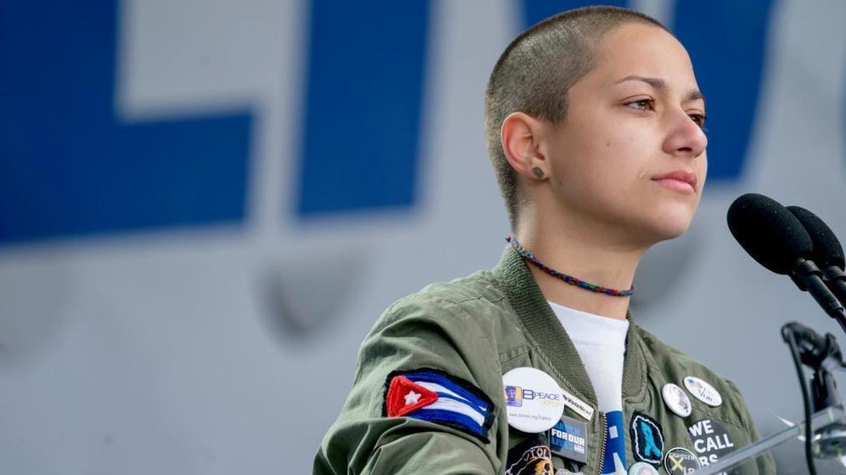 Emma Gonzalez, a survivor of the mass shooting at Marjory Stoneman Douglas High School in Parkland, Fla., closes her eyes and cries as she stands silently at the podium and times the amount of time it took the Parkland shooter to go on his killing spree during the "March for Our Lives" rally in support of gun control in Washington, Saturday, March 24, 2018.