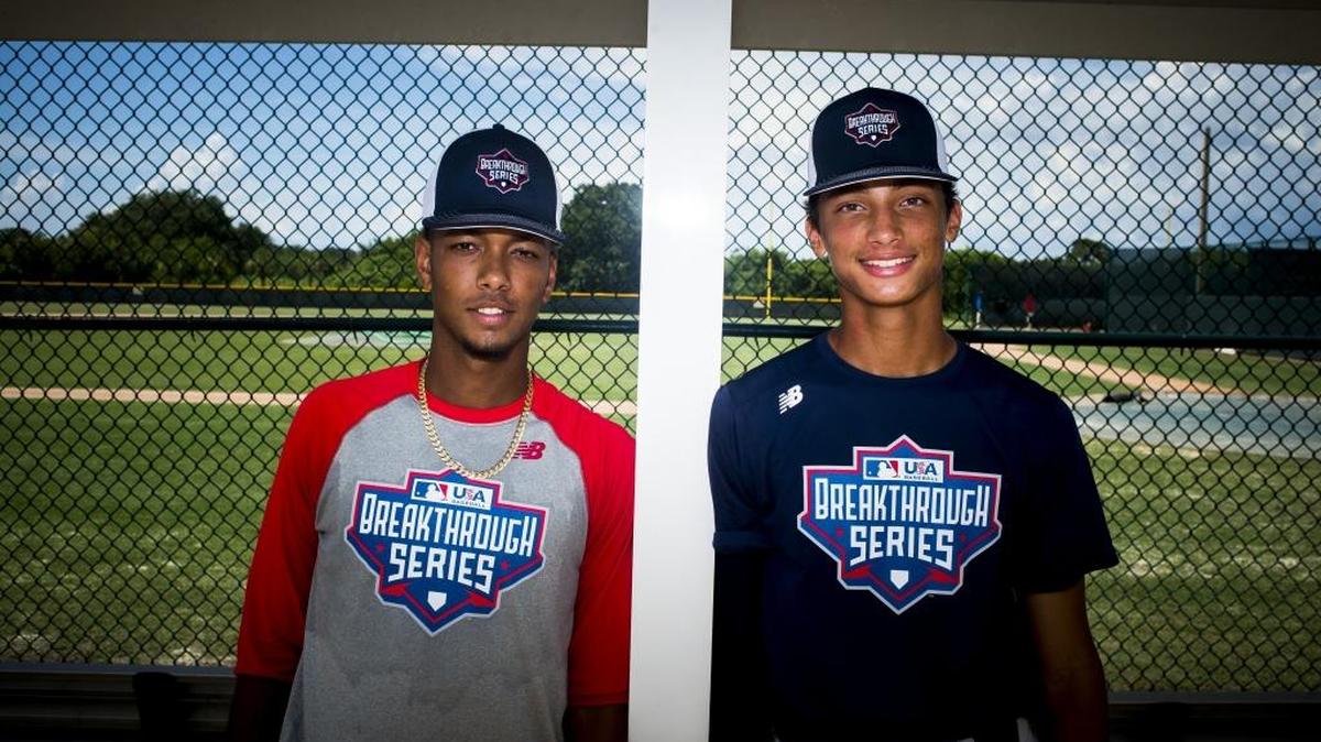 Lakewood Ranch High's Pablo Garabitos, left, and Out of Door Academy's Tai Gilbert, right, pose for a portrait after participating at the MLB Breakthrough event on Thursday afternoon at Pirate City in Bradenton.