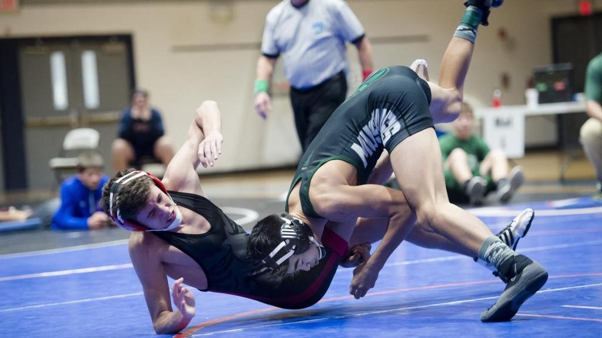 Lakewood Ranch's Hunter Reed takes down Palmetto's Brendan Valley at the Manatee County wrestling championship on Saturday morning, February 11, 2017 at Southeast High School in Bradenton.