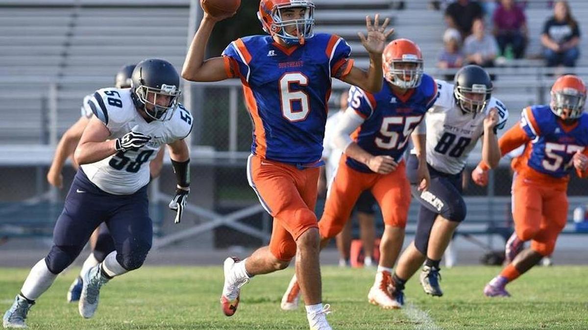 Southeast quarterback Alex Taylor prepares to pass during a spring football game May 19 against visiting North Port.