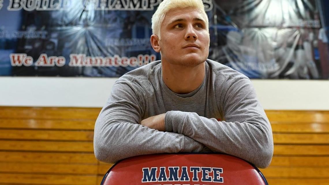 Last year, this wrestler dislocated his shoulder. Now he’s trying to win a state championship.