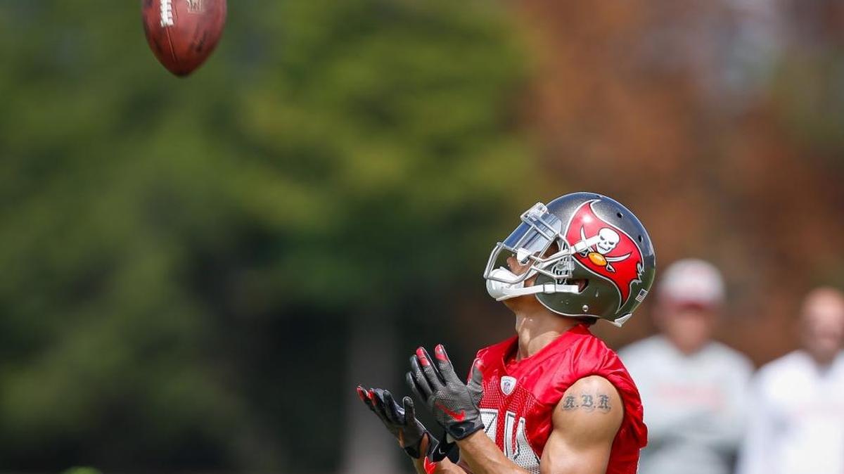 Tampa Bay cornerback Brent Grimes practices catching punts during the third day of mandatory minicamp at One Buccaneer Place on June 15 in Tampa.