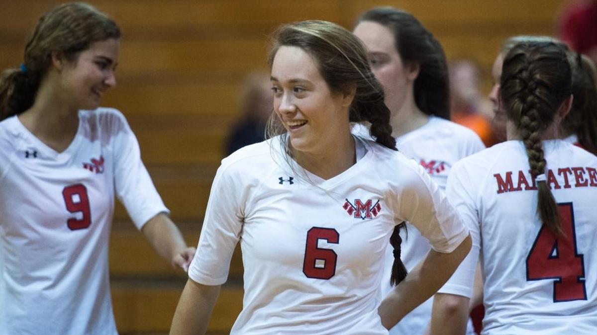Gabby Coulter smiles after celebrating a successful point against Sarasota on Oct. 18. Coulter and her sister JoJo helped Manatee erase a 2-0 deficit before falling to St. Thomas Aquinas in the Class 8A state semifinal on Saturday in Fort Lauderdale.