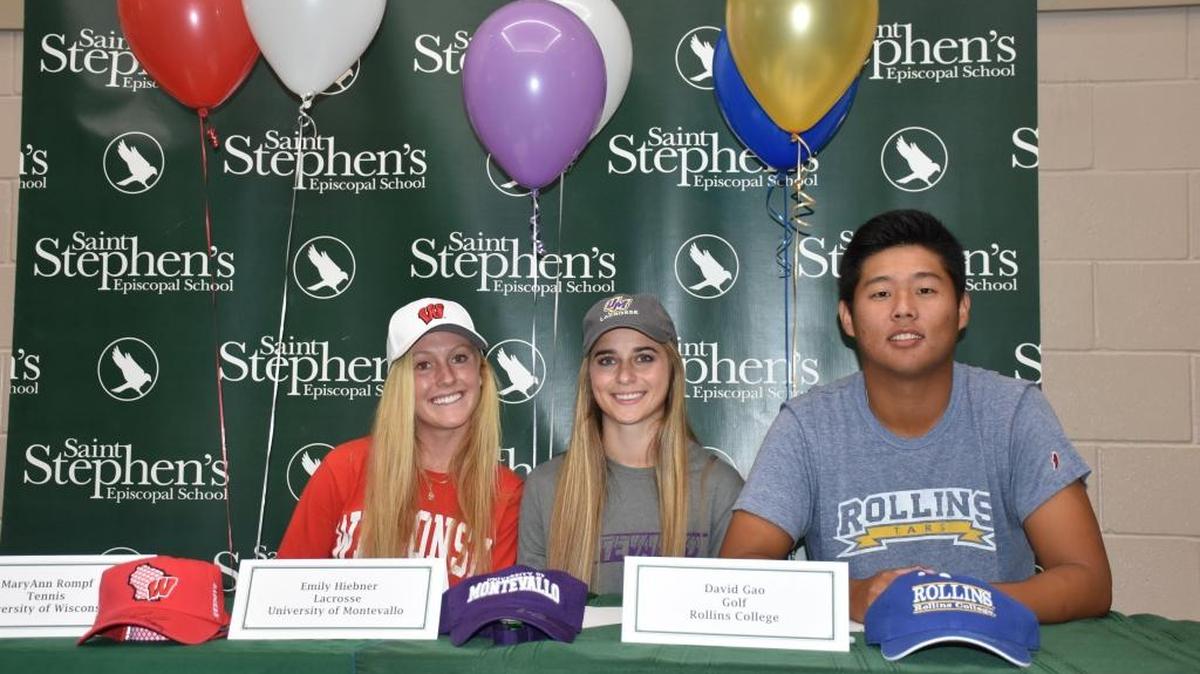 David Gao (right) celebrates with fellow Saint Stephen’s athletes during a signing ceremony at the school. HERALD FILE PHOTO.