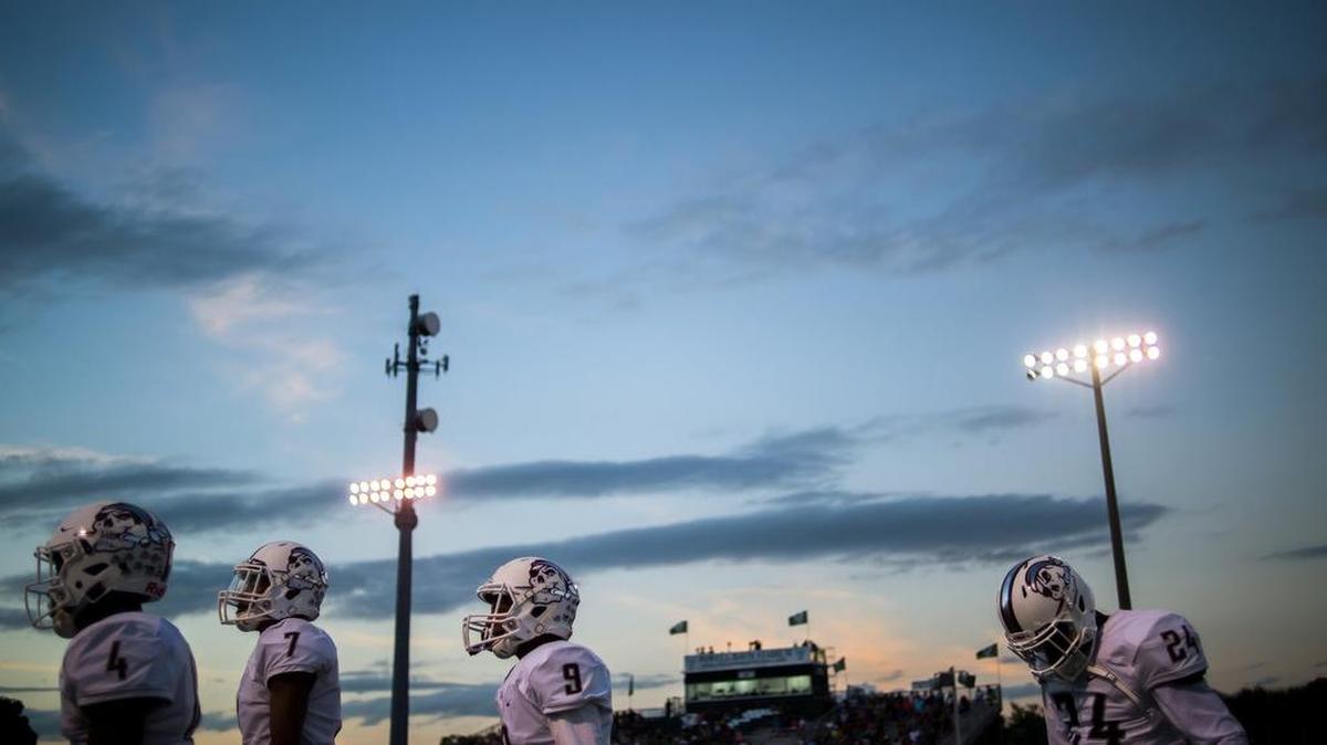 Braden River High School players, from left, Raymond Thomas, Demetrius Lawson, Tommie Battie and Paul Wiggins walk onto the field during Braden River’s game at Venice on Friday.