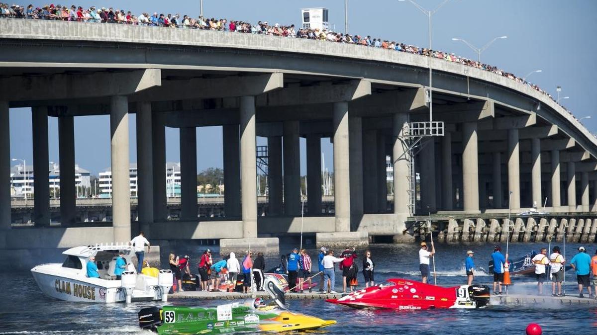 Fans watch from the Green Bridge as racing boats warm up during the third annual Bradenton Area River Regatta on Feb. 4 on the Manatee River in Bradenton.