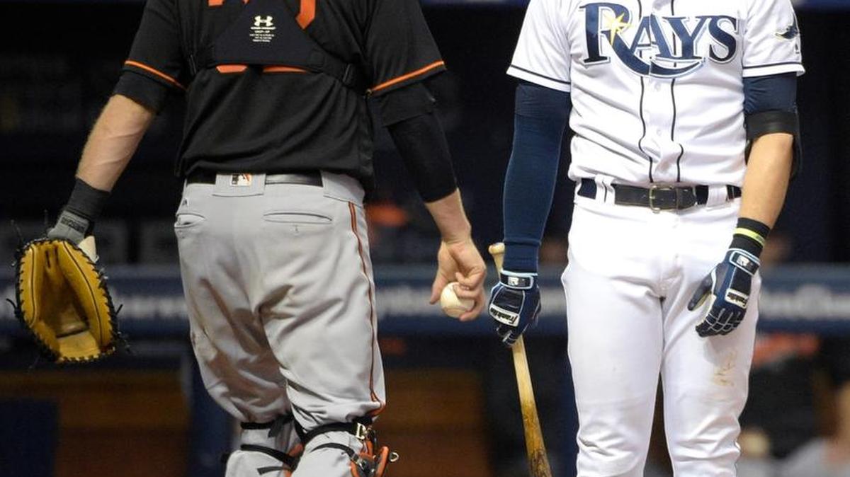 Tampa Bay’s Evan Longoria, reacts after striking out to end the sixth inning Friday in St. Petersburg.