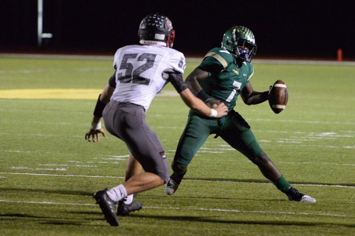 Saint Stephen’s quarterback Fred Billy runs for a touchdown in a Sunshine State Athletic Conference semifinal game against Jupiter Christian.