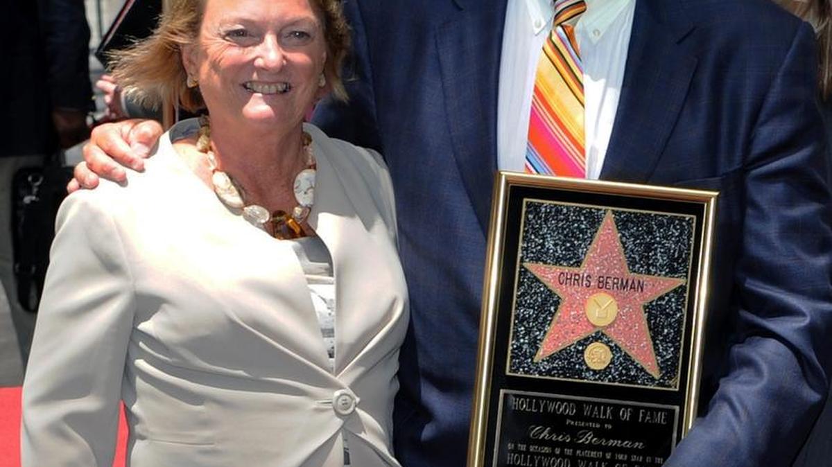 In this May 24, 2010, photo provided by ESPN, sportscaster Chris Berman stands with his wife, Katherine, upon receiving his star on the Hollywood Walk of Fame in Los Angeles. The wife of longtime ESPN broadcaster Chris Berman died in a two-vehicle traffic accident in Connecticut on Tuesday.