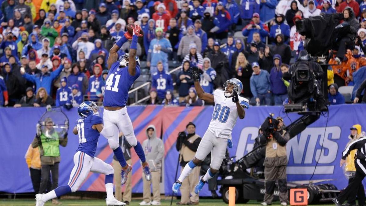 Giants cornerback Dominique Rodgers-Cromartie intercepts a pass intended for Detroit’s Anquan Boldin that helped secure a victory.