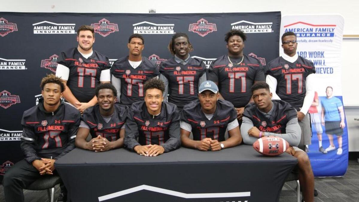 IMG Academy is sending a record 10 football players to the Under Armour All-American Game in January. The players received game jerseys in a presentation Wednesday. Clockwise from back left: Robert Hainsey, Isaiah Pryor, Dylan Moses, Cesar Ruiz, Robert Beal, Joshua Kaindoh, Jhamon Ausbon, Kellen Mond, Marcus Williamson, Grant Delpit.