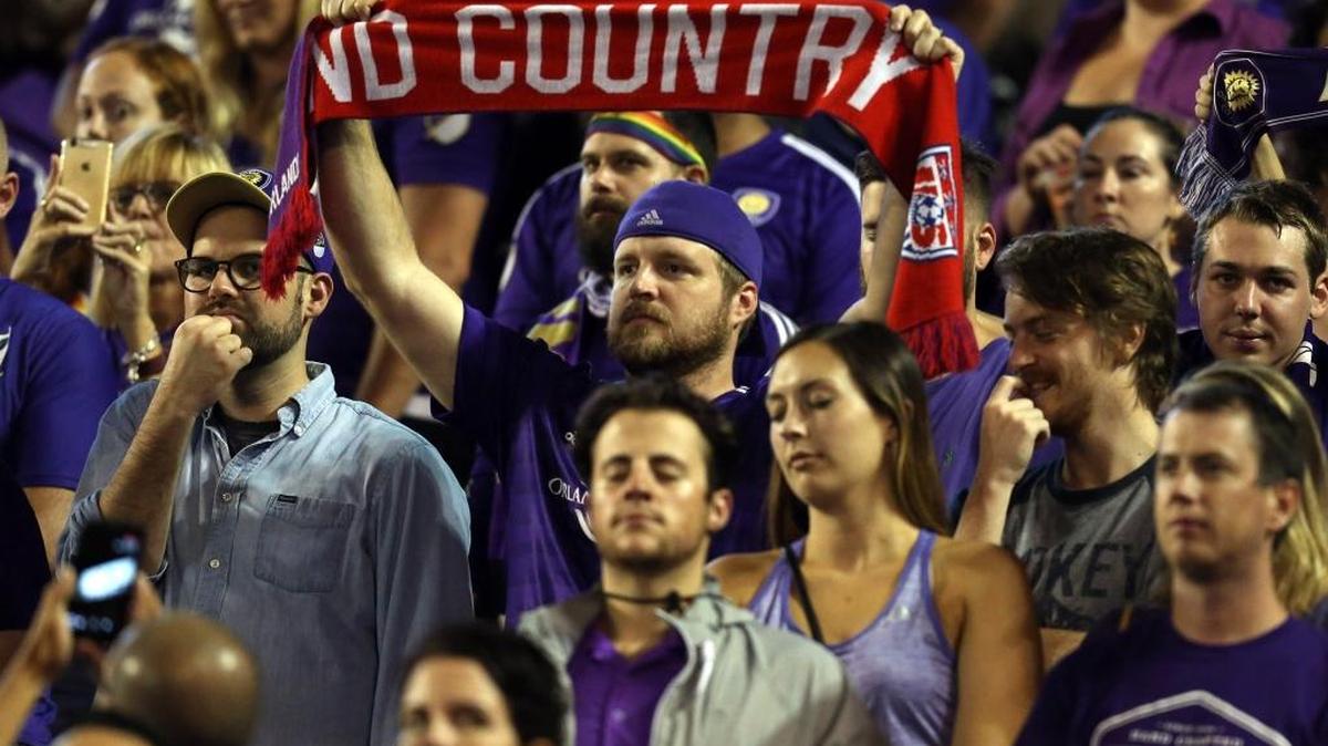 Fans at Camping World Stadium in Orlando stand for a moment of silence honoring the victims of the Pulse nightclub massacre as Orlando City played host to the San Jose Earthquakes on Saturday.
