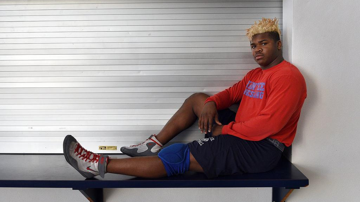 Joshua Booker shined as a football player, a wrestler and now as a weightlifter. He earned a berth in the state weightlifting championships by winning his weight class at regionals on Thursday.