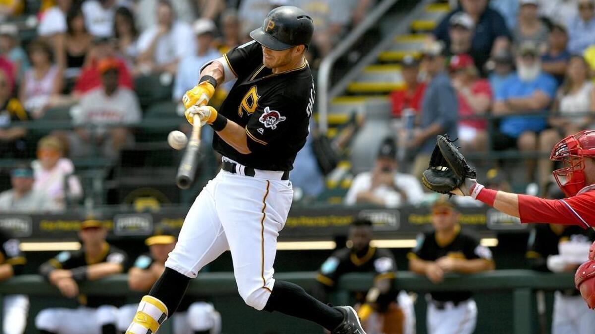Pittsburgh Pirates outfielder Corey Dickerson connects during the first inning of Monday’s game against the Philadelphia Phillies at LECOM Park.