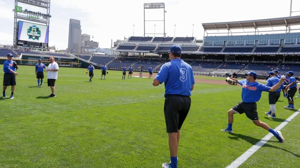 Florida players throw during team practice in Omaha, Neb., on Friday. Florida plays TCU in its College World Series opener on Sunday.