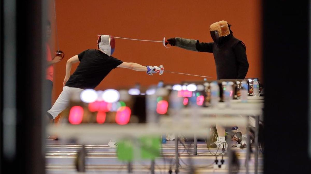 Fencers practice Aug. 3 in a training room in Riocentro ahead of the 2016 Summer Olympics in Rio de Janeiro, Brazil.