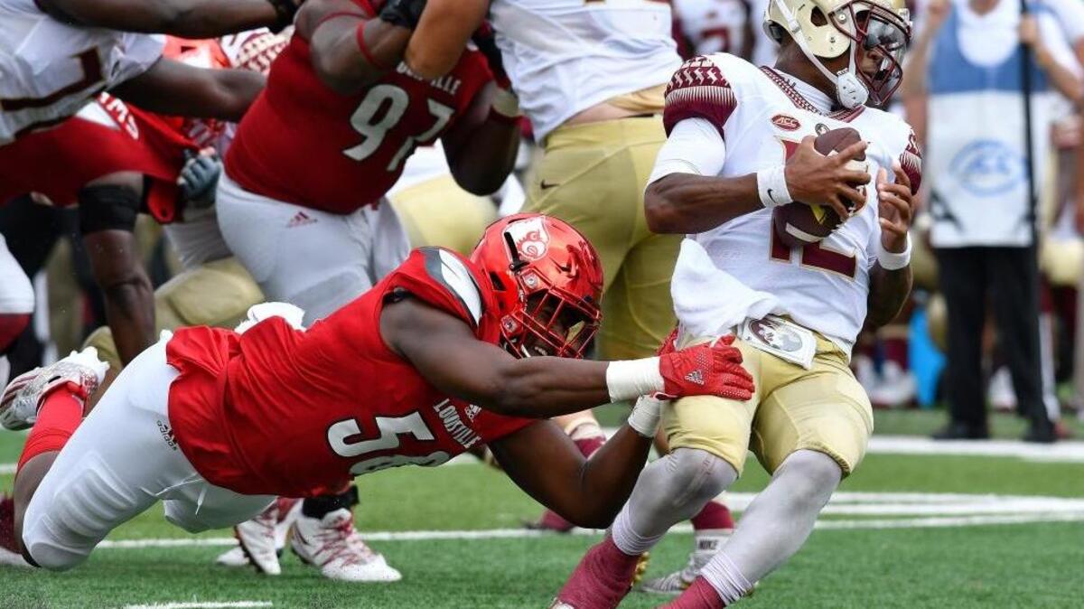 Florida State quarterback Deondre Francois is sacked by Louisville linebacker Jonathan Greenard on Saturday.