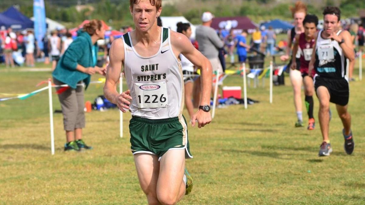 Henry Howell heads to the finish line during the Class 1A Region 2 boys cross country race Friday at Holloway Park in Lakeland. Howell finished fifth, helping Saint Stephen’s finish second and advance to next week’s state meet in Tallahassee.