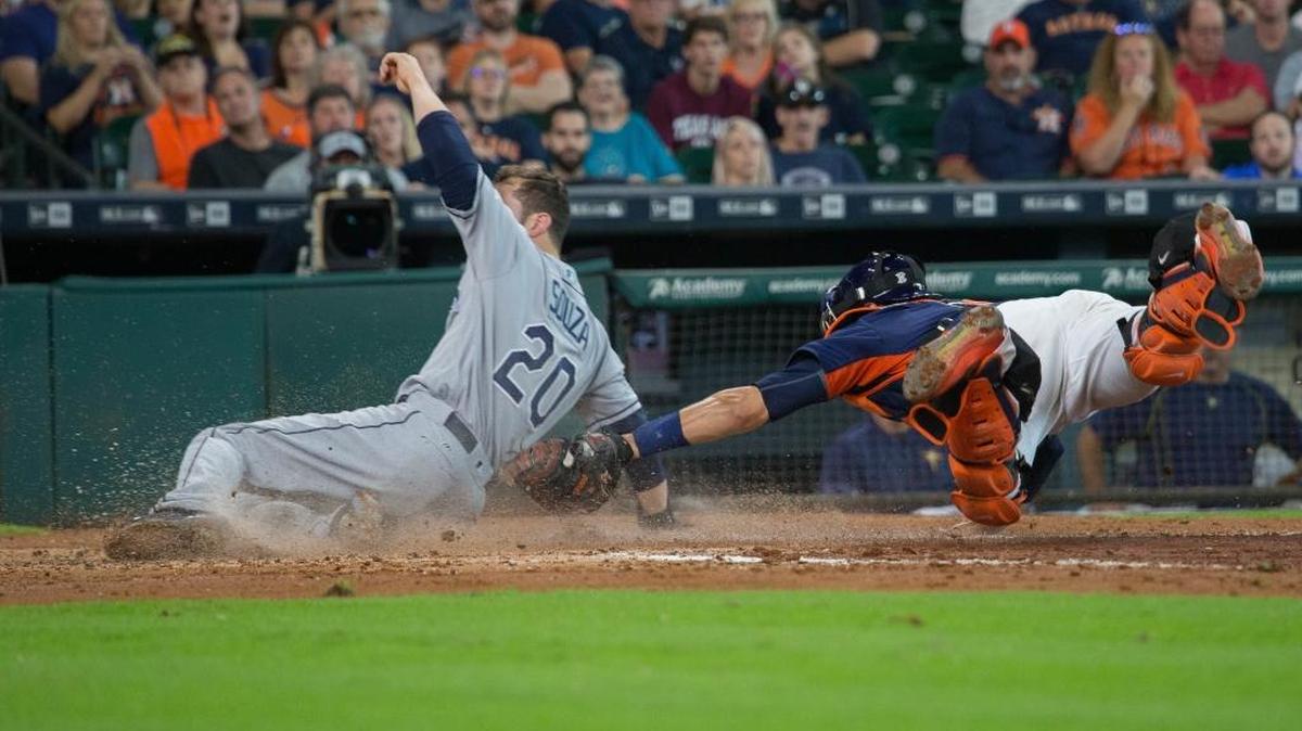 Tampa Bay’s Steven Souza Jr. scores ahead of the tag from Houston catcher Jason Castro in the fourth inning Sunday in Houston.