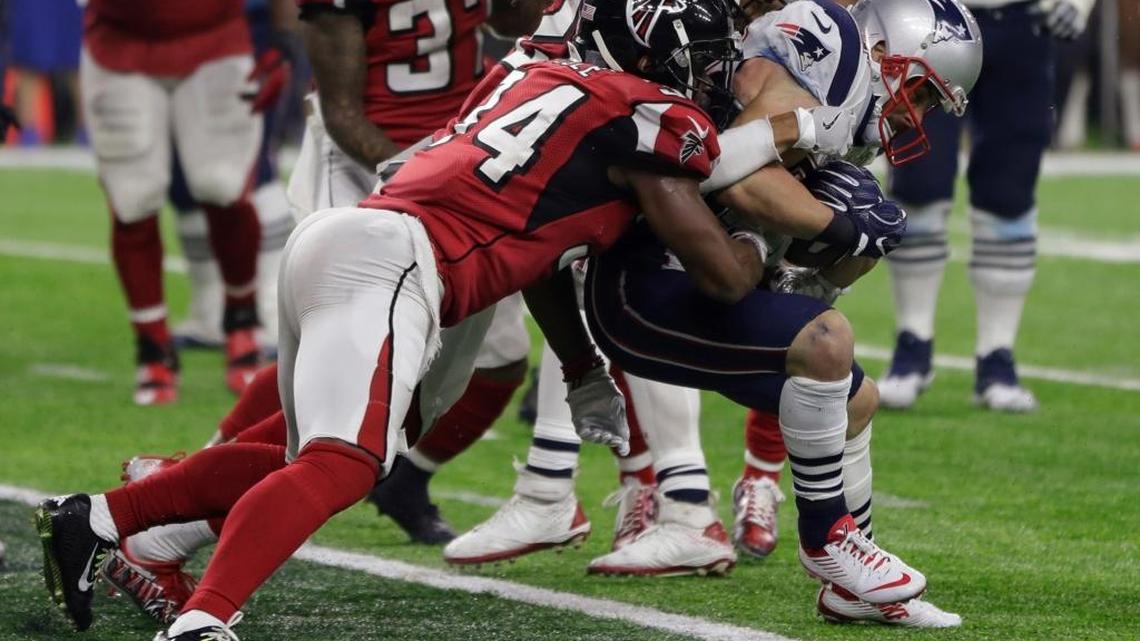 Former Southeast High standout Brian Poole tackles Patriots wide receiver Danny Amendola during the second half of Super Bowl 51.