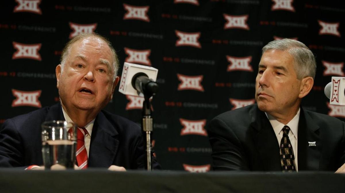 Oklahoma President David Boren, left, speaks as Big 12 Commissioner Bob Bowlsby looks on during a news conference during which the Big 12 announced that its members had decided against expansion.