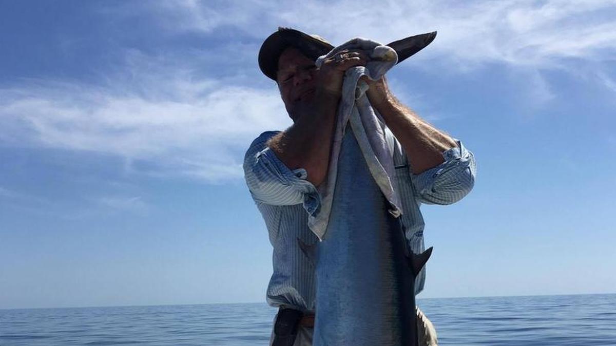 Bob Gelzheiser holds the 58-pound wahoo he and Travis Amuso caught while fishing approximately 30 miles off Sarasota in the Gulf of Mexico before last week’s cold front pushed through the area.
