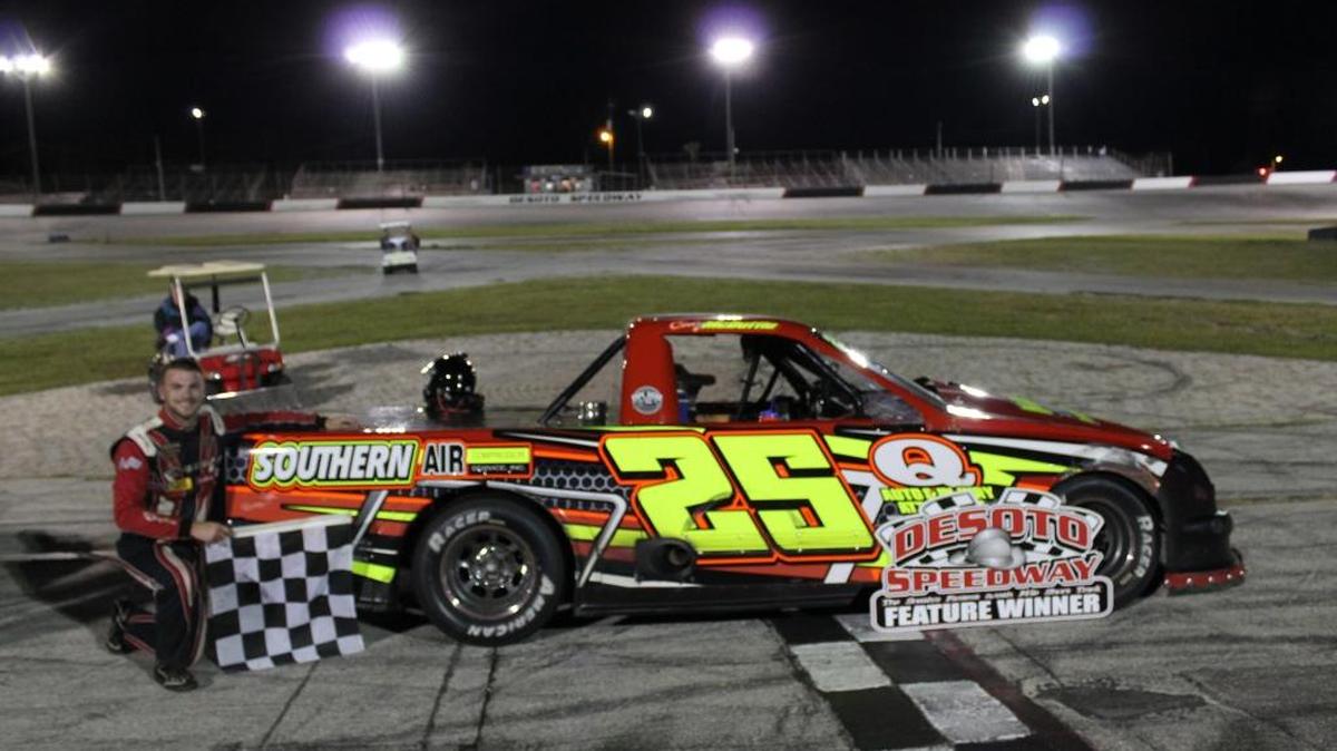 Cody McDuffie and the No. 25 after his victory Saturday night in the Q Auto & Injury Desoto Pro Trucks race at Desoto Speedway.