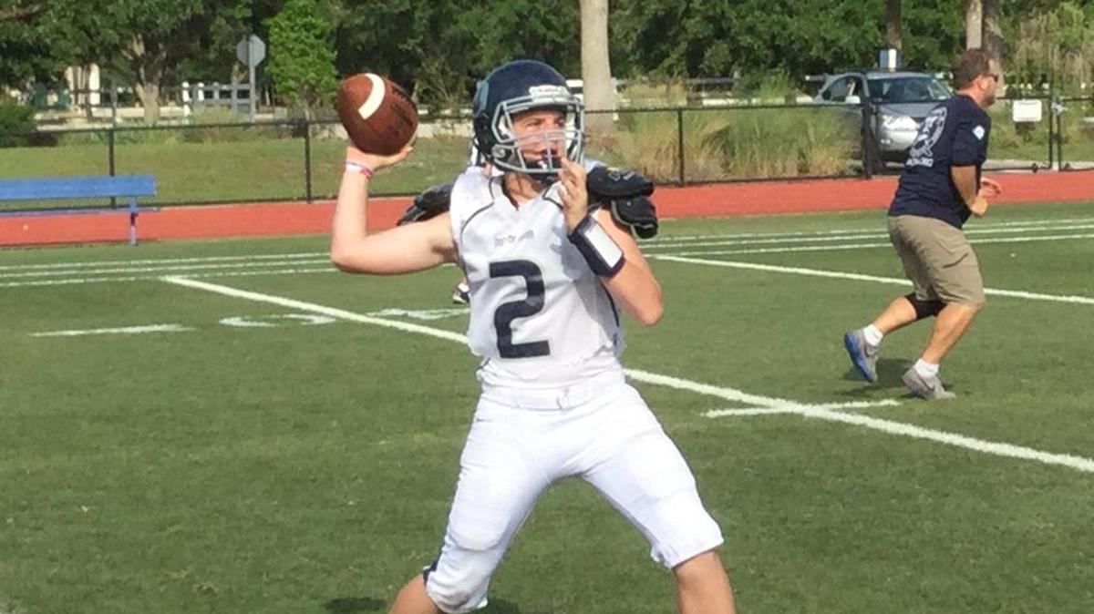 Out-of-Door Academy’s Anthony Squitieri throws a pass during spring practice.