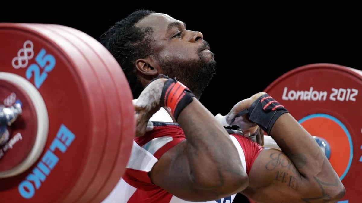 In this Aug. 3, 2012, file photo, Kendrick Farris of the United States competes during the men’s 85-kg. group B, weightlifting competition at the 2012 Summer Olympics in London. Farris, Morghan King, Jenny Arthur and Sarah Robles will represent the U.S. at the Rio Olympics.