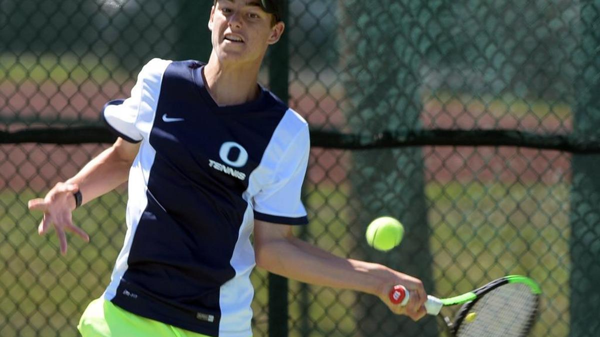 Jake Krug of Out-of-Door Academy hits a return during the Class 1A-District 9 tournament on April 11. Krug and his Thunder teammates won their regional first-round match on Tuesday and will face Saint Stephen’s on Thursday.