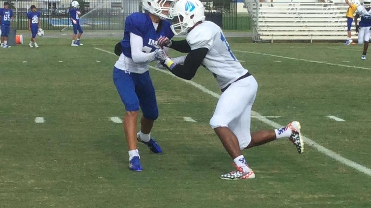 IMG Academy’s Isaiah Pryor, right, works off a block in Wednesday’s practice. Pryor returns home to Georgia when IMG faces nationally ranked Grayson on Saturday.