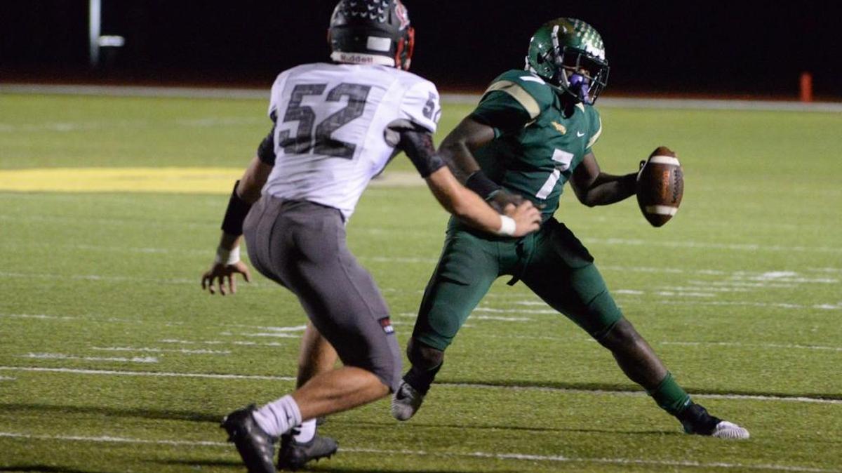 Saint Stephen’s quarterback Fred Billy runs 14 yards for the Falcons’ first touchdown Saturday in the Sunshine State Athletic Conference semifinals.