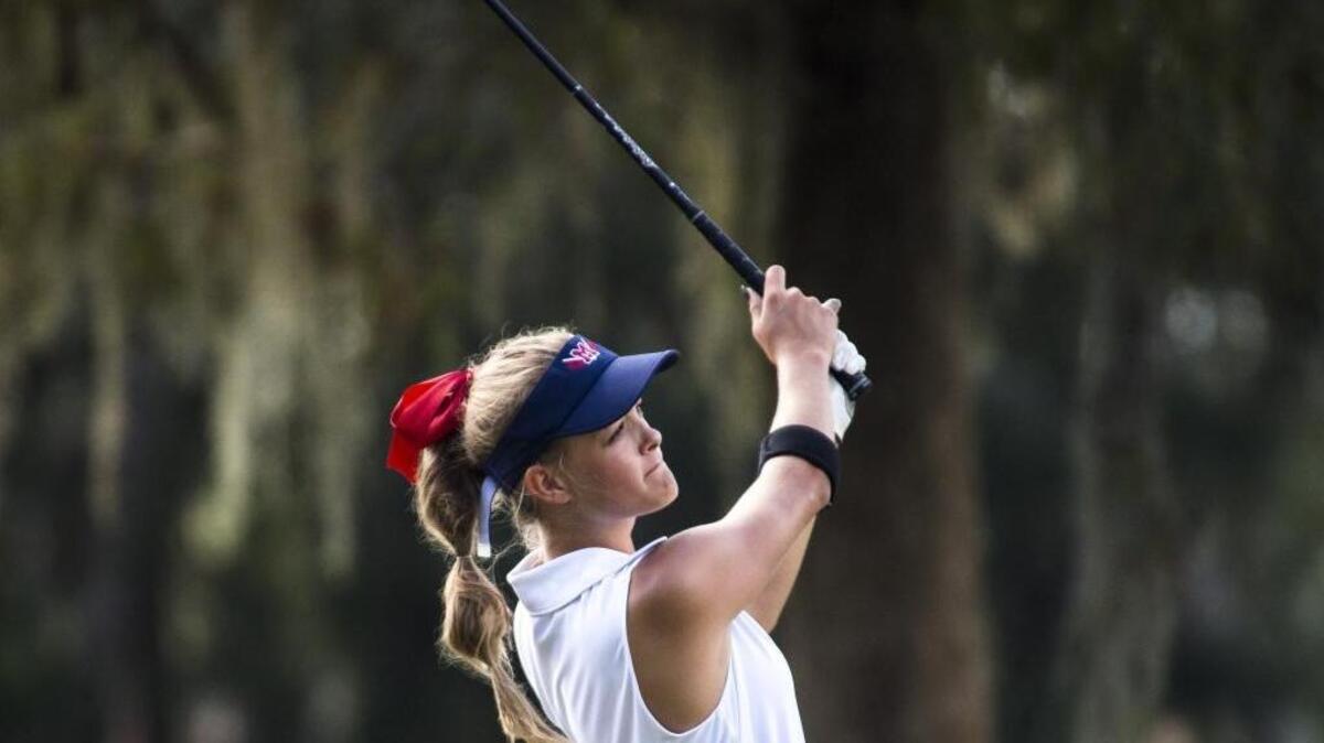 Manatee’s Gabrielle Tomeo watches her ball soar through the air as schools throughout the county compete in the Donald Ross Memorial Invitational, the annual high school boys and girls golf tournament at Sara Bay Country Club on Tuesday afternoon.