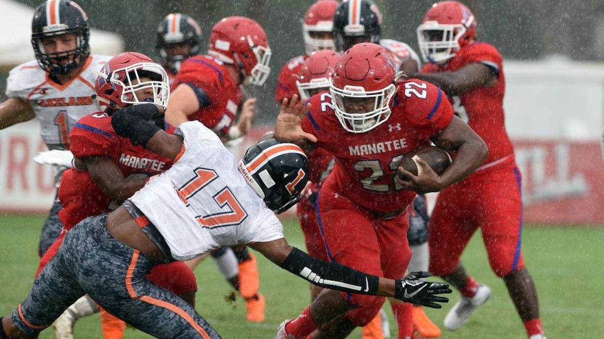 Manatee High’s Josh Booker, shown against Lakeland earlier in the season, powered his way to 136 rushing yards and three touchdowns during Thursday night’s win against Tampa Alonso.