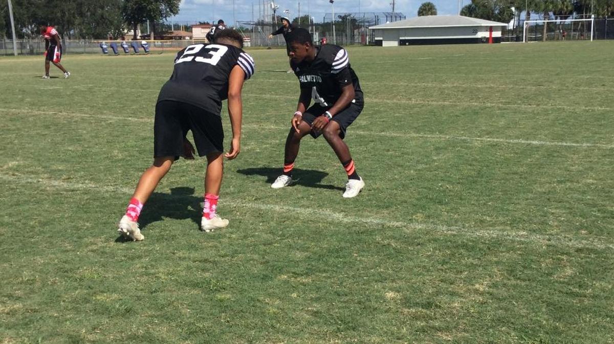 Palmetto’s Desmine Ross (right) prepares for defensive drills before practice in preparation for Braden River quarterback Louis Colosimo this Friday.