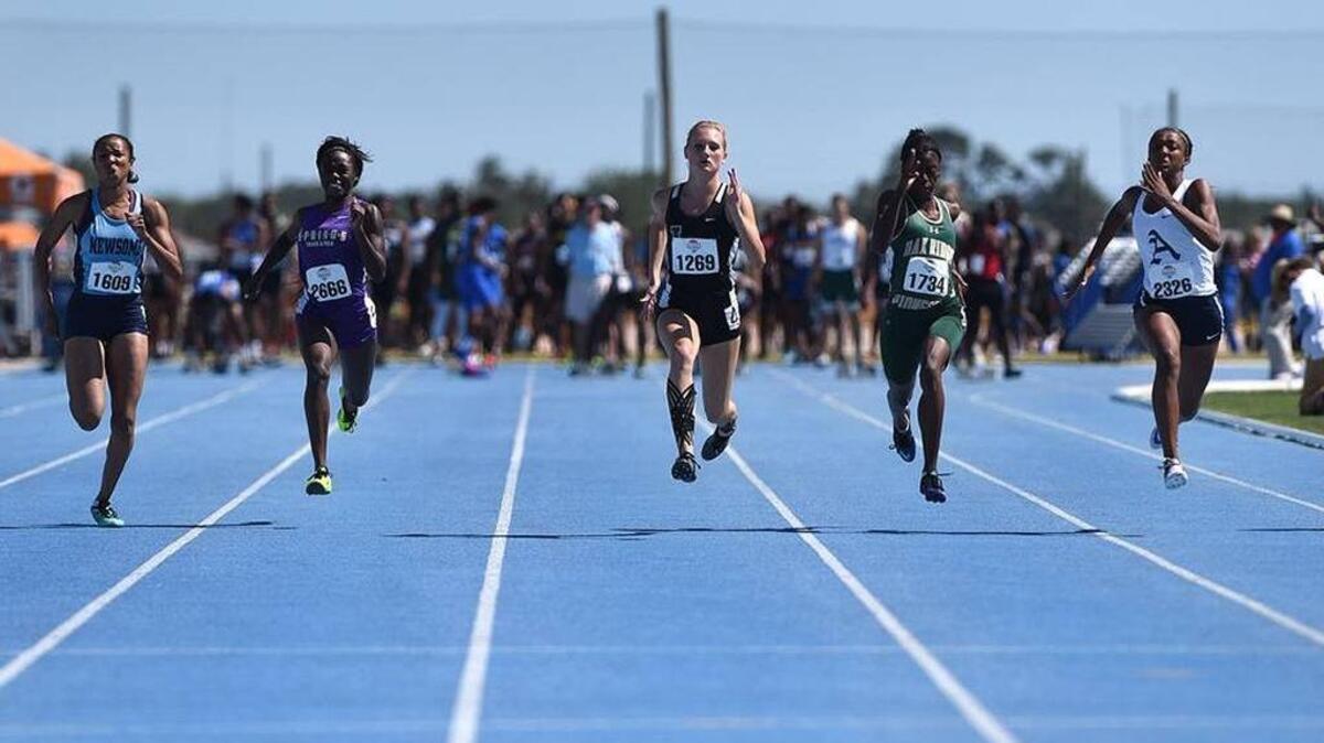 Sophia Falco (center) won a gold medal and two silvers at the Class 4A championship last year at IMG Academy. The FHSAA is bringing the state title meets back to Bradenton in 2017.