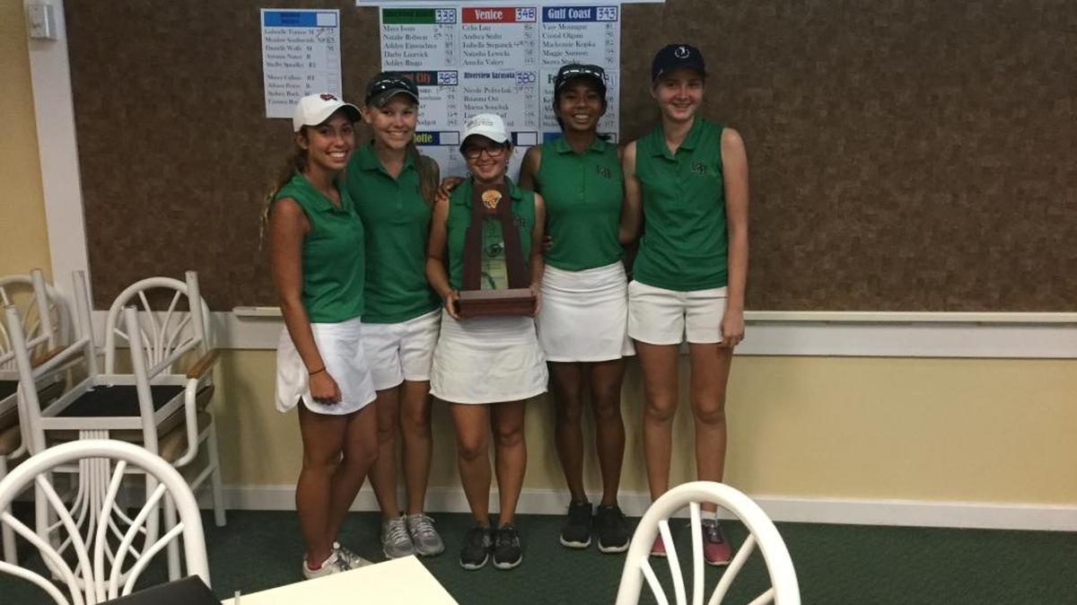 Lakewood Ranch’s girls golf team shows off the trophy for winning Monday’s tournament in Venice.
