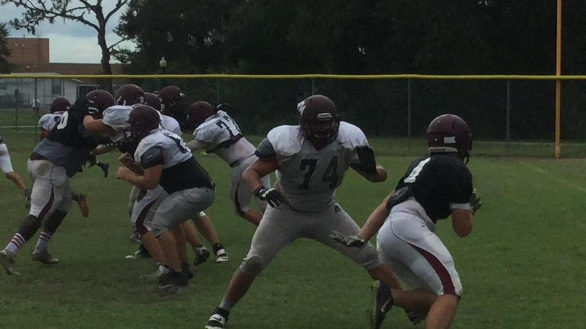 Braden River needs a big season from its offensive line, which includes Leo Pita (No. 74) blocking during a fall practice.